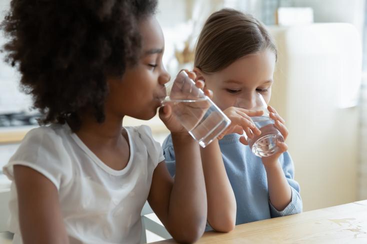 Kids clean water-iStock.com, fizkes-no resale products.jpg