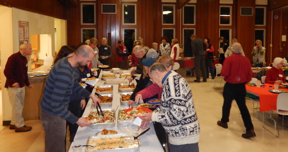 party attendees in buffet line