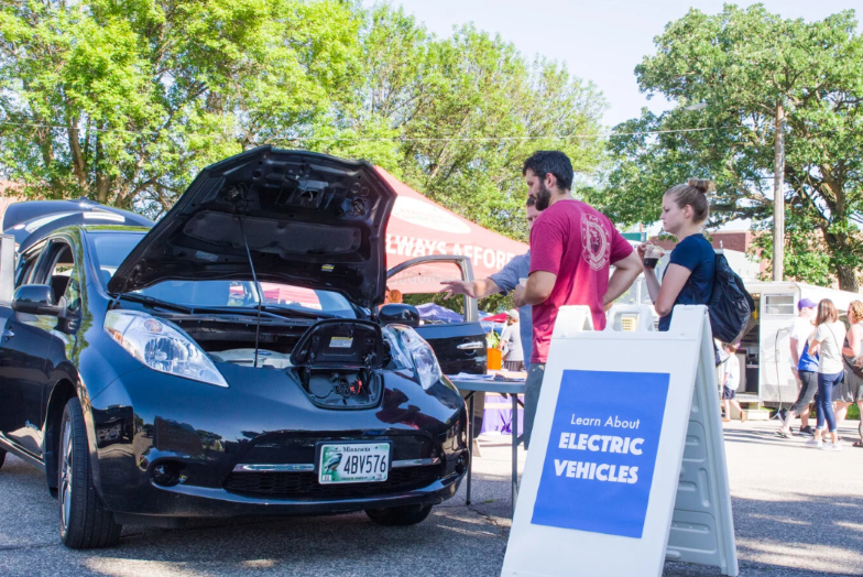 Visitors at an EV show