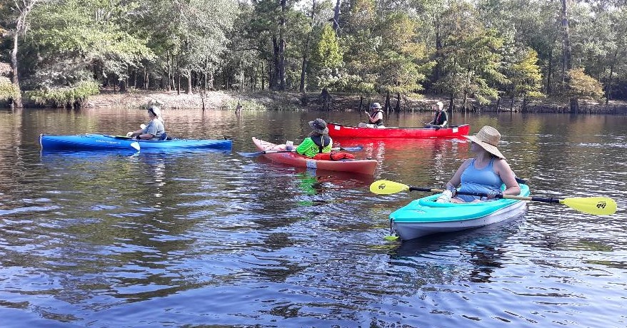 paddlers in canoes